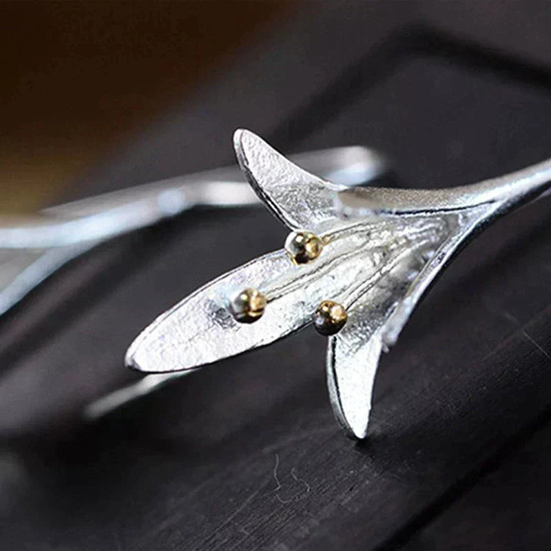 Blomsterformede øreringe i sølv