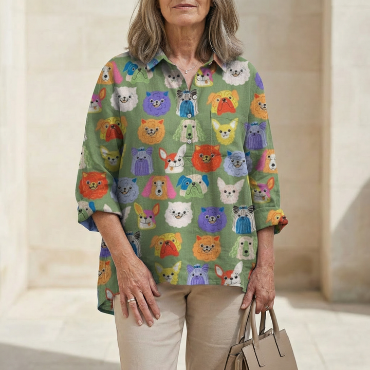 Blusa verde com caras de animais